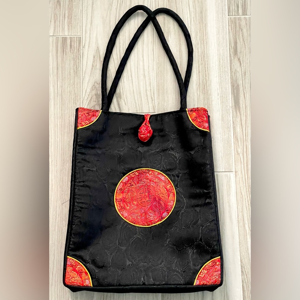 Black and Red Tote Bag with Asian-Inspired Medallion